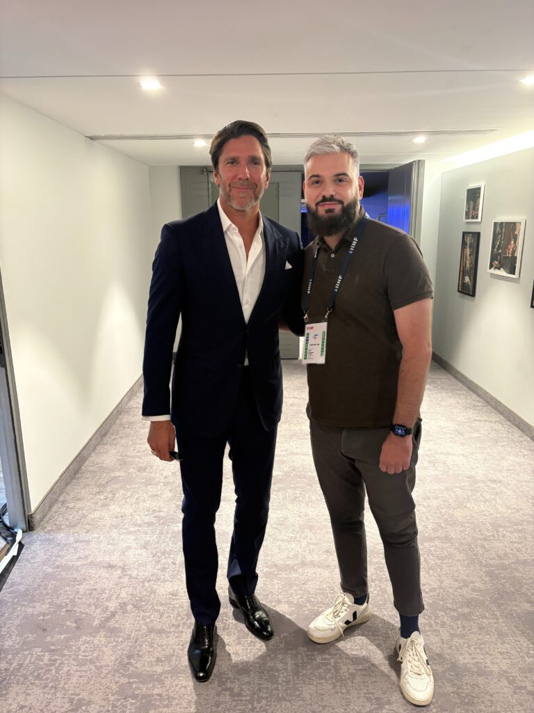 A photo of former NHL player Henrik Lundqvist with Karim Kerbouche